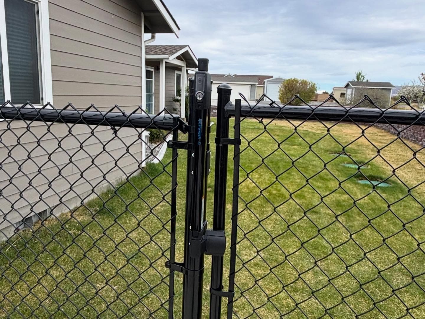 5-foot black chain link fence gate with MagnaLatch latch