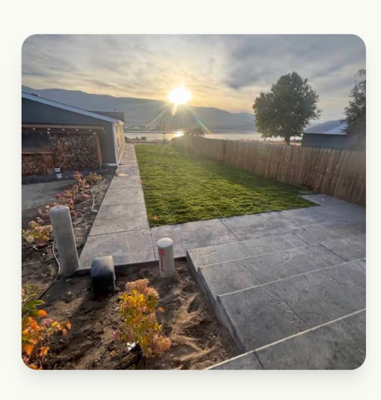 Landscaped yard at sunset