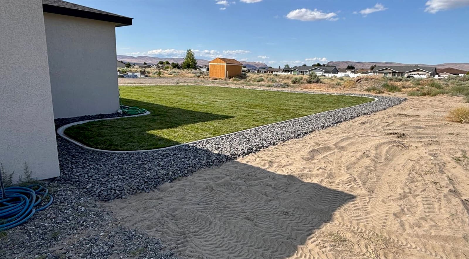 Real sod and curbing installation by Martinez Landscaping