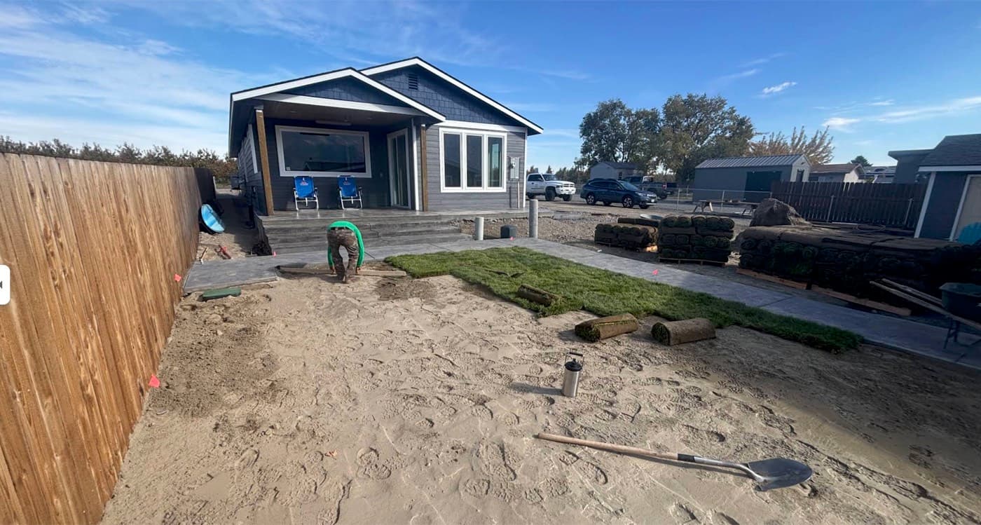 Sod being laid on new construction